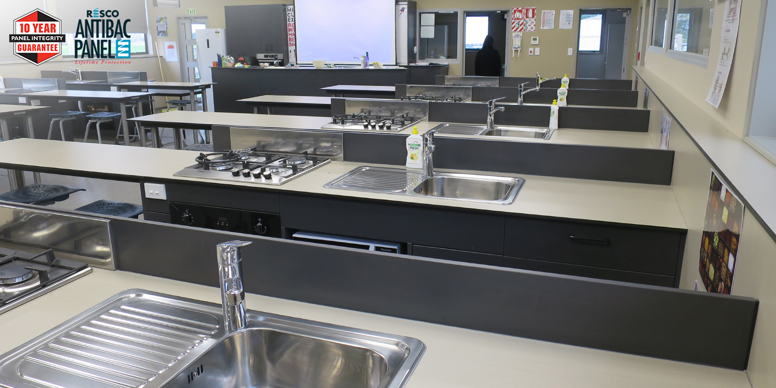 High school opts for Resco Compact Laminate panels for hardy, hygenic benchtops in food tech lab.